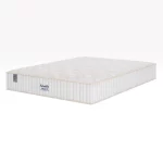 Colchão Sealy Miami com Mola Pocket Ensacada de 26cm em um quarto aconchegante e moderno.